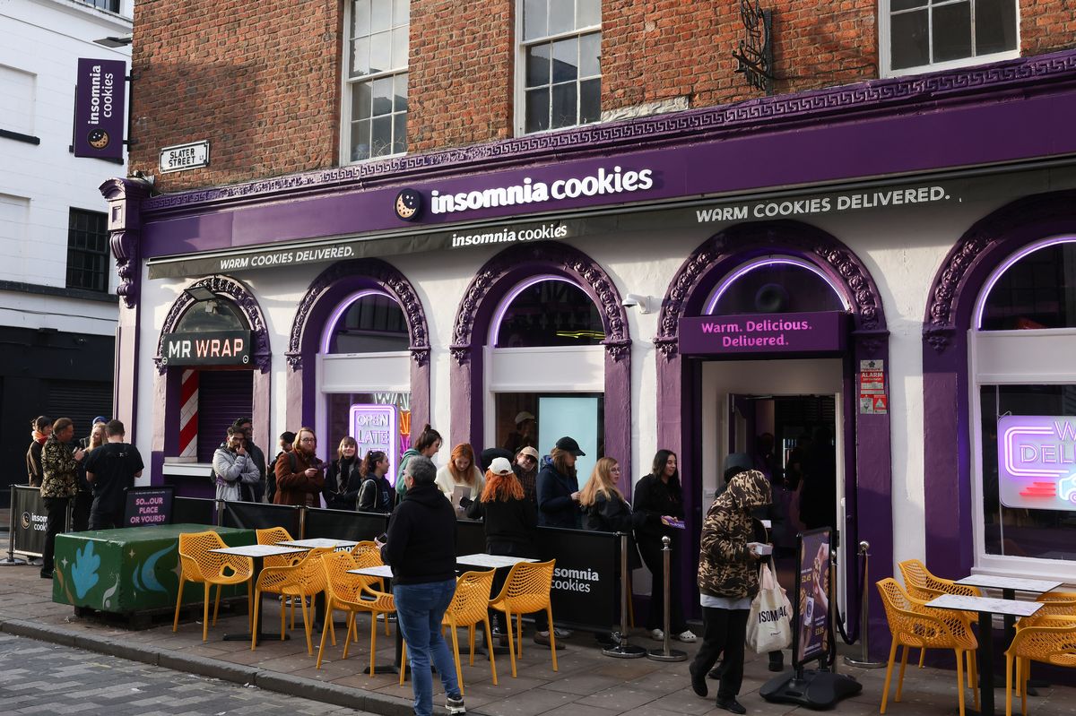 A queue for Insomnia Cookies on Slater Street this afternoon