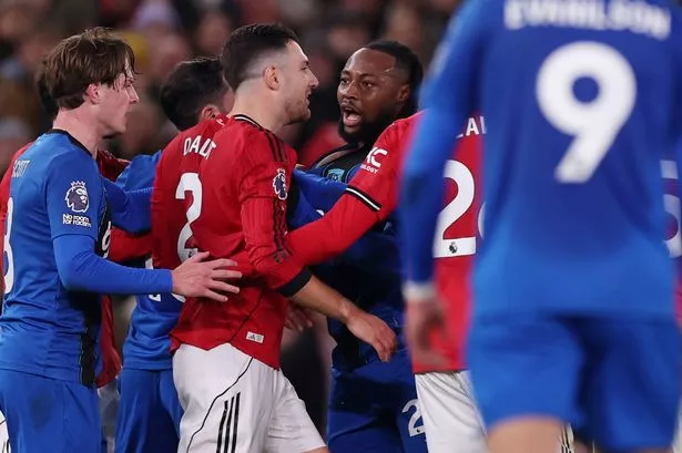Diogo Dalot of Manchester United and Antoine Semenyo of Bournemouth