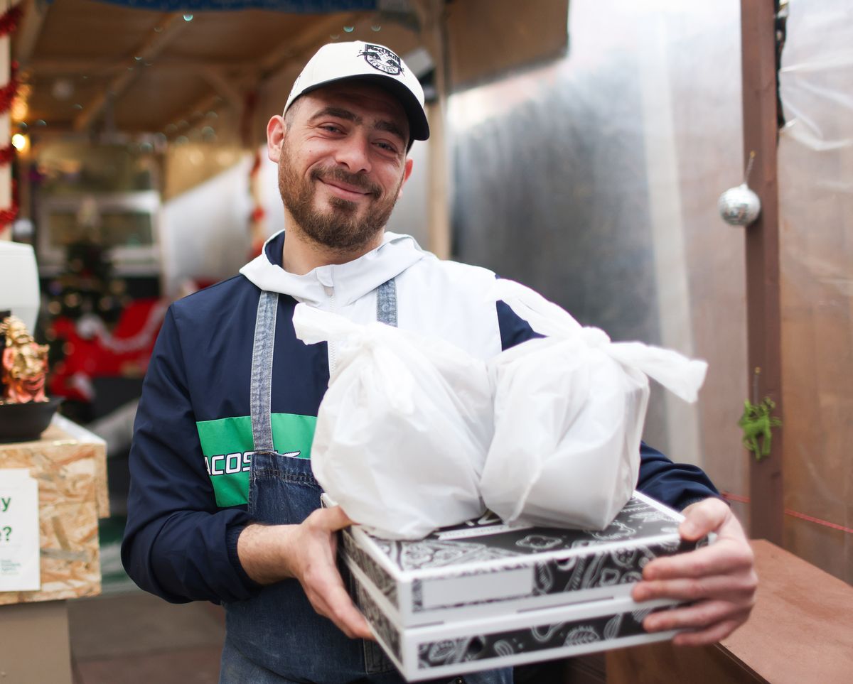 Antonio Valente with some of the takeaway orders from his business in Birkenhead