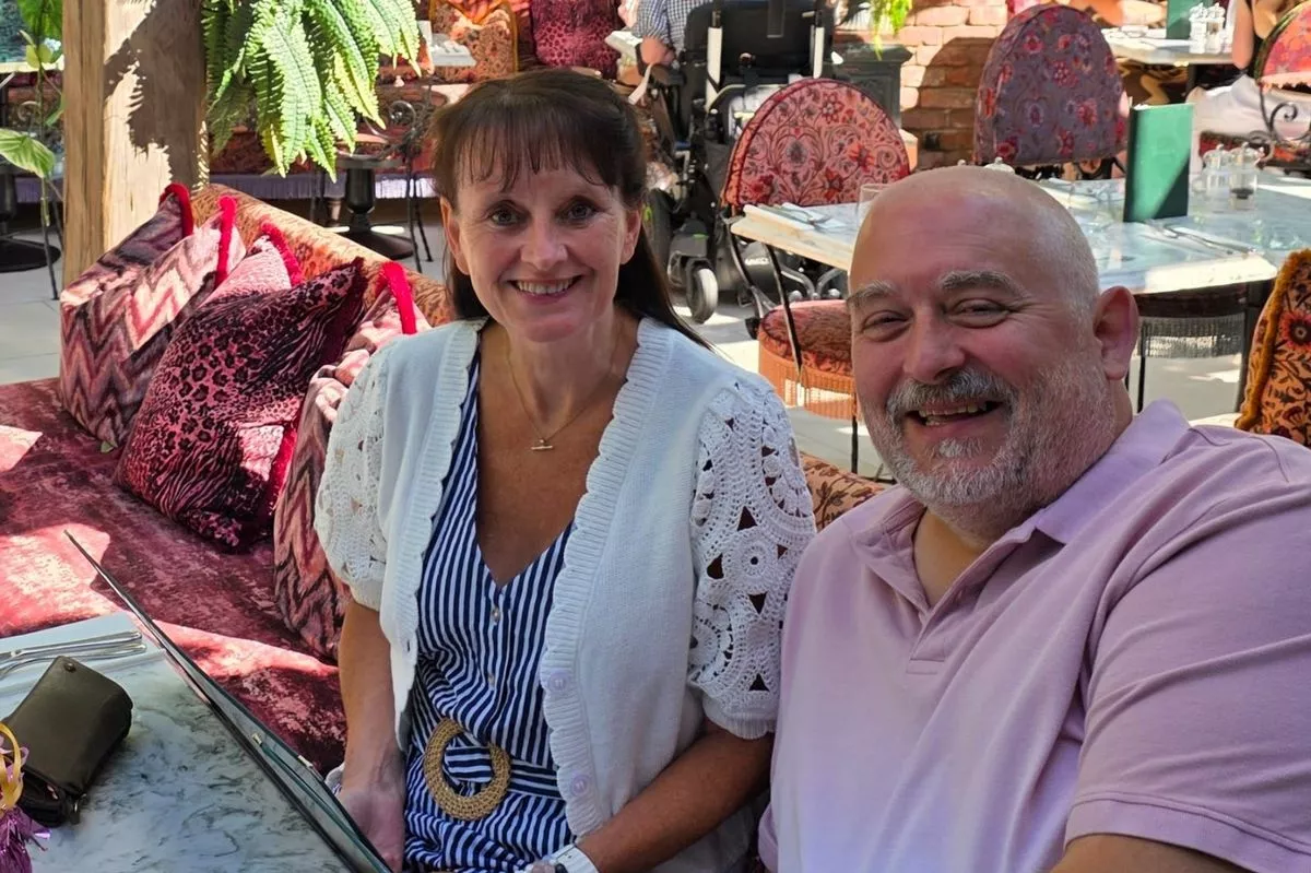 Sue and Dave Cook have received MBEs for their services to foster care in St Helens