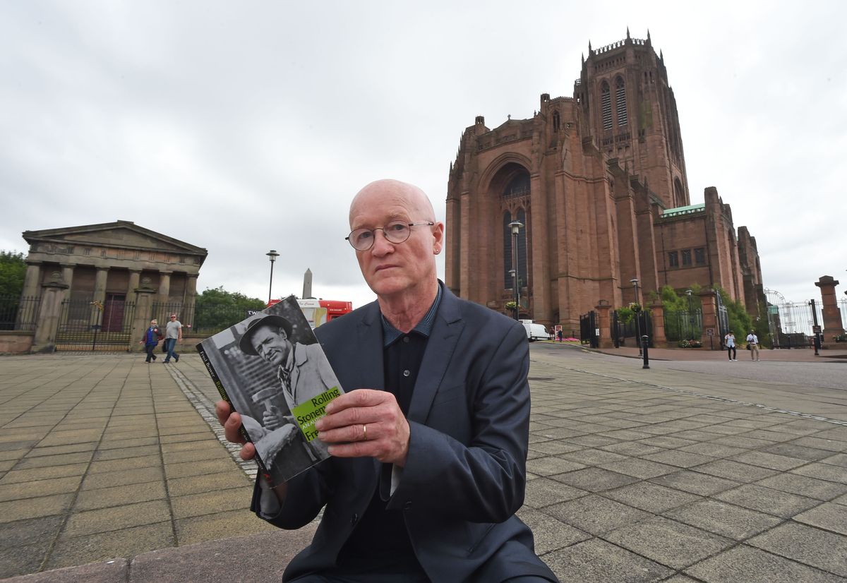 Author Ron Noon at Liverpool Cathedral and his publication about Liverpool stonemason Fred Bower
