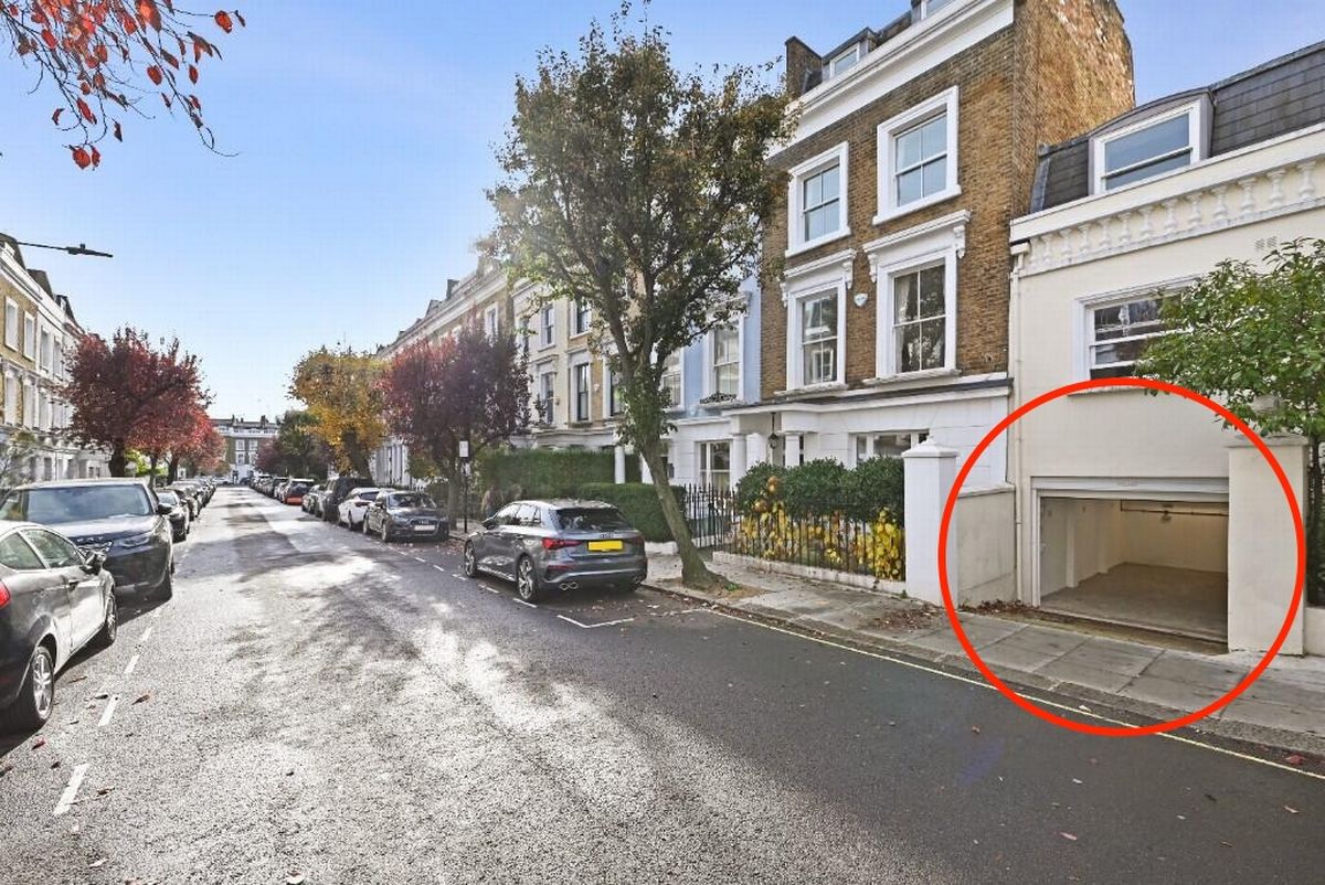 The secured parking spot costs more than the average home in Manchester