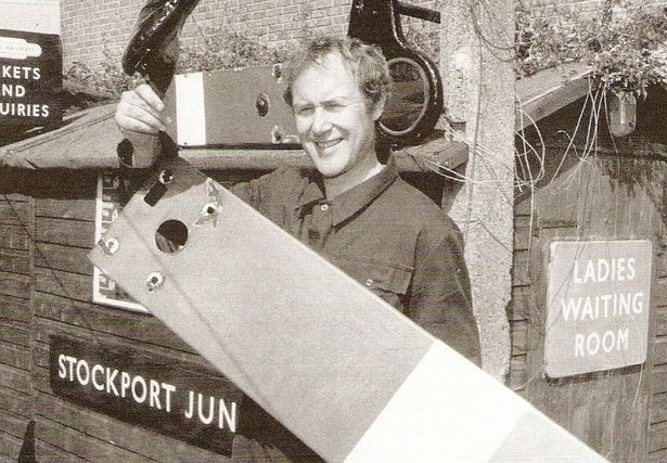 Mel Thorley with his garden full of railway memorabilia 