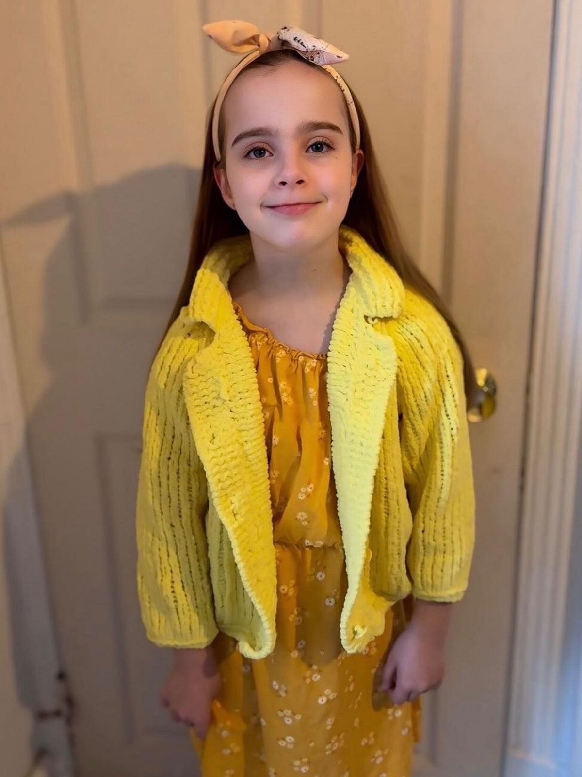 Eliana wearing yellow for World Mental Health Day 