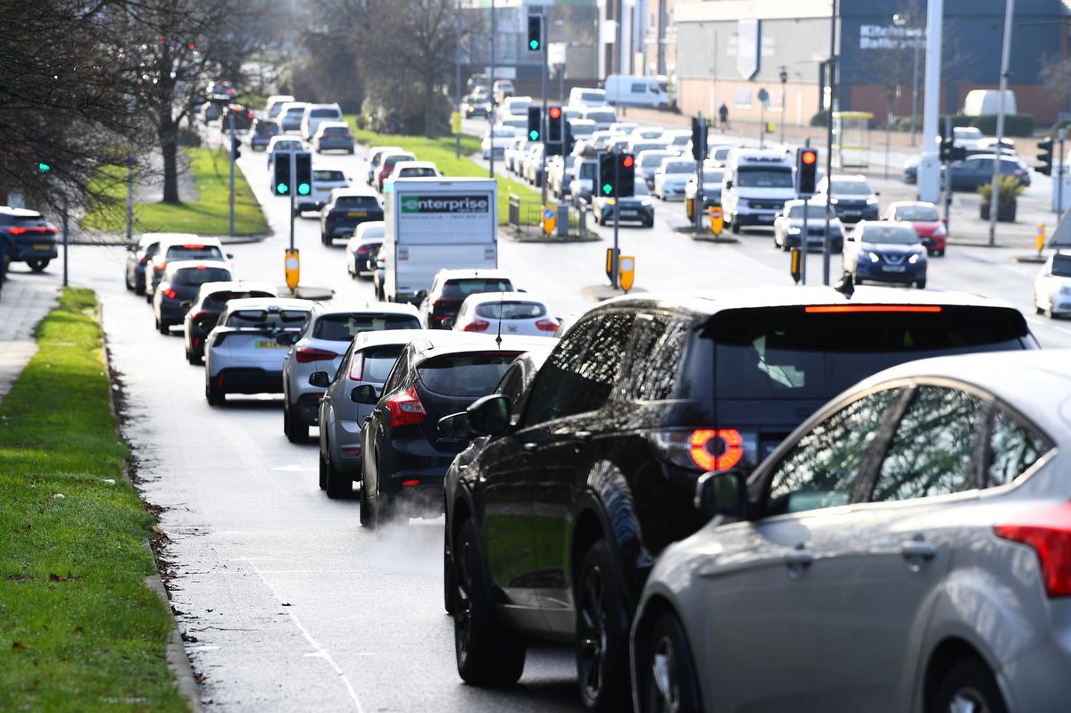 Motorists queue to go into Aintree Shopping Park