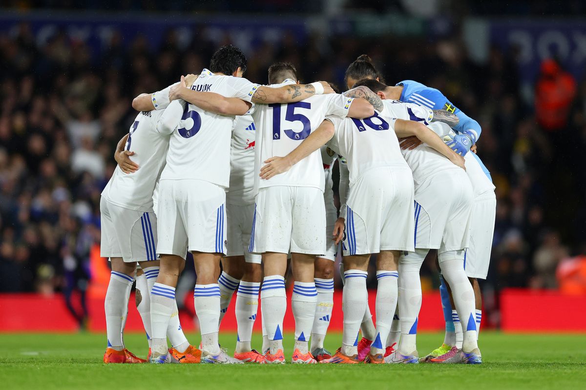 Leeds United players huddle before a game