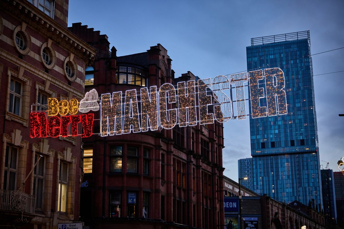 The 'Bee Merry Manchester' sign on Deansgate