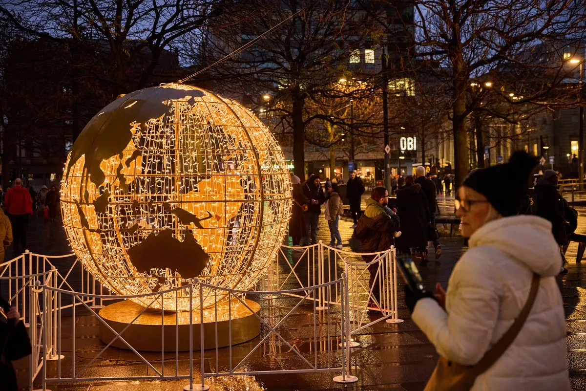 A giant golden globe in St Peter's Square