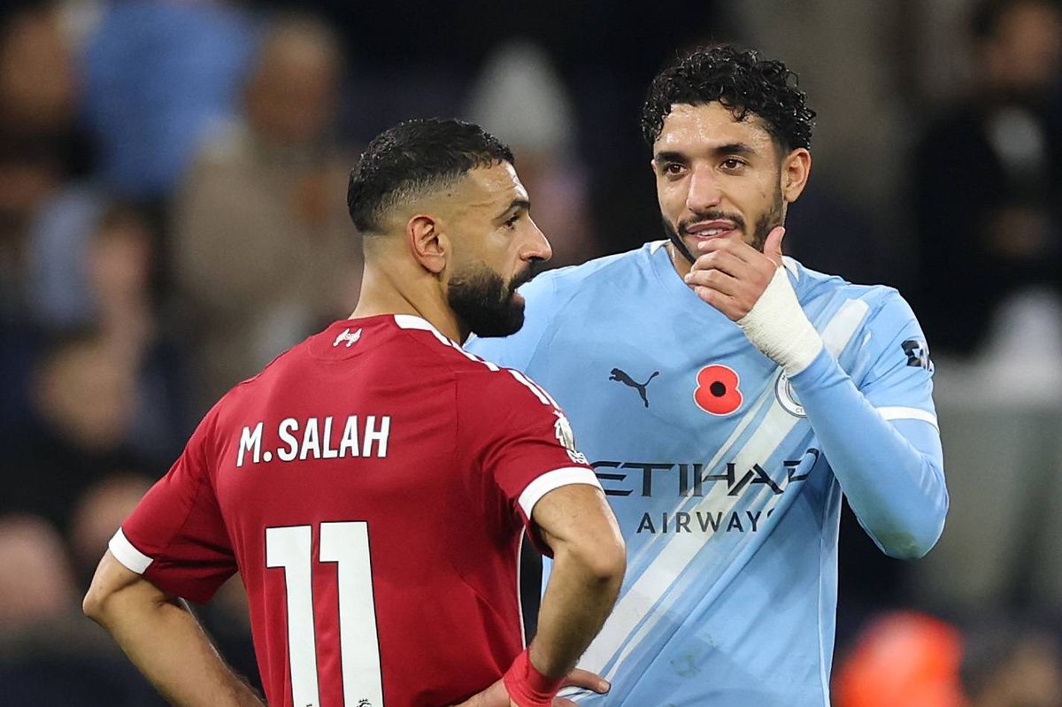 Omar Marmoush of Manchester City speaks with Mohamed Salah of Liverpool after the Premier League match between Manchester City and Liverpool at Etihad Stadium
