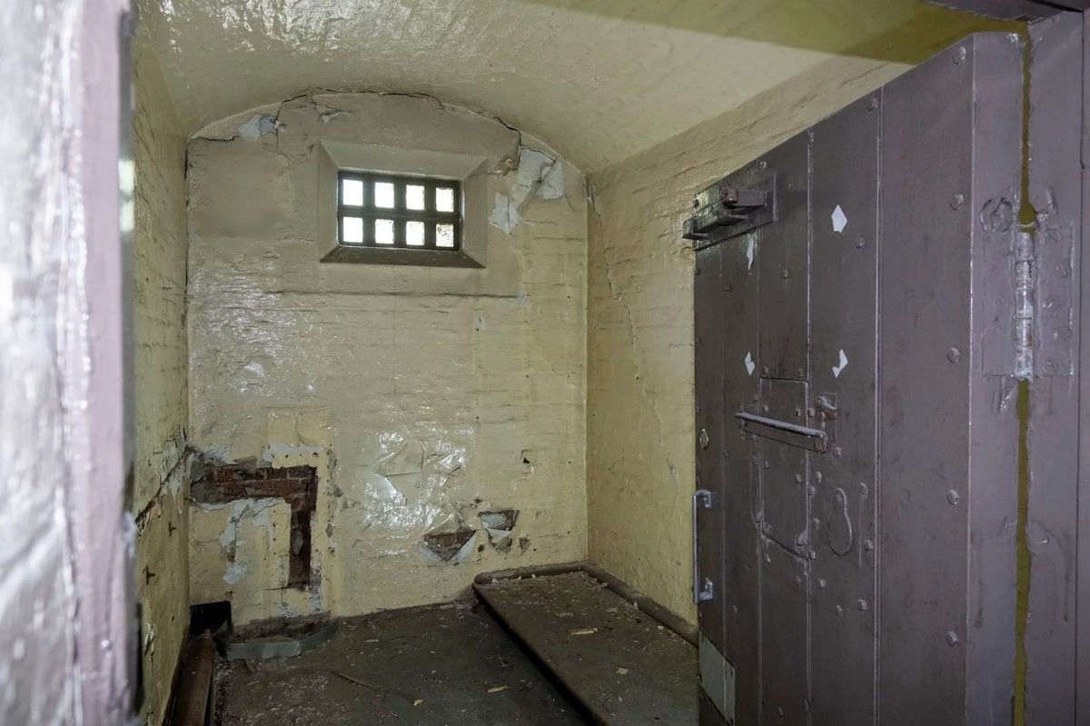 Photographs of a former police station and law courts in Prescot