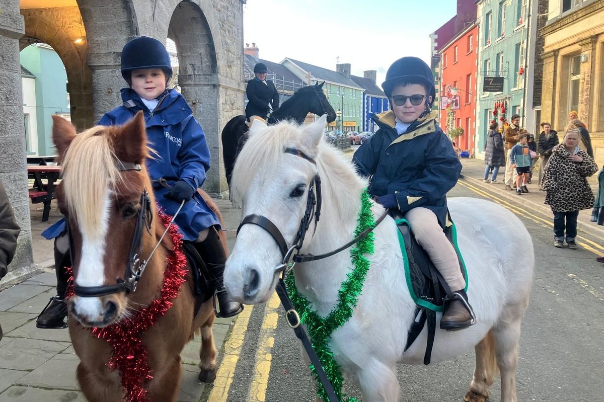Children pictured on the back of horses