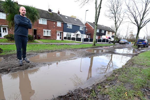 Resident Jacob Maguire and pothole covered Homer Road.
