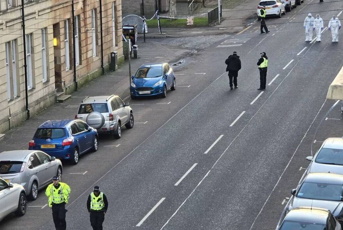 Police on scene with hazmat teams nearby as the road remains locked down on Boxing Day