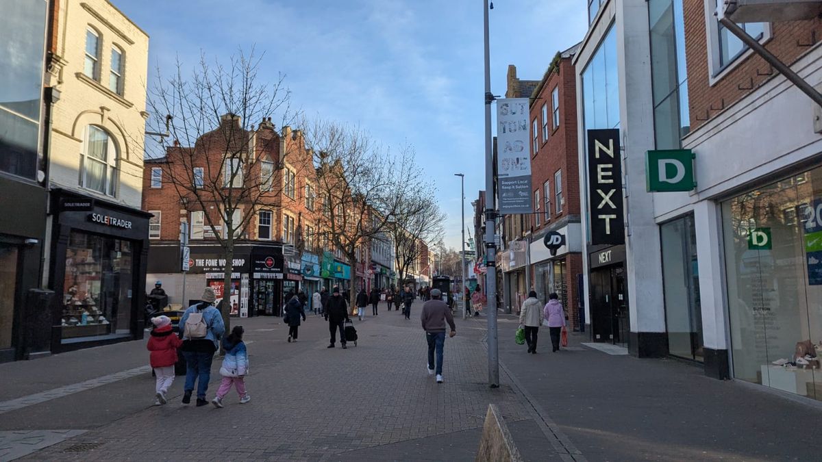People walking along Sutton High Street