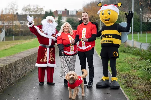 Natalie, Ross and Baxter are hoping to raise
vital funds for the charity by doing the Santa Dash