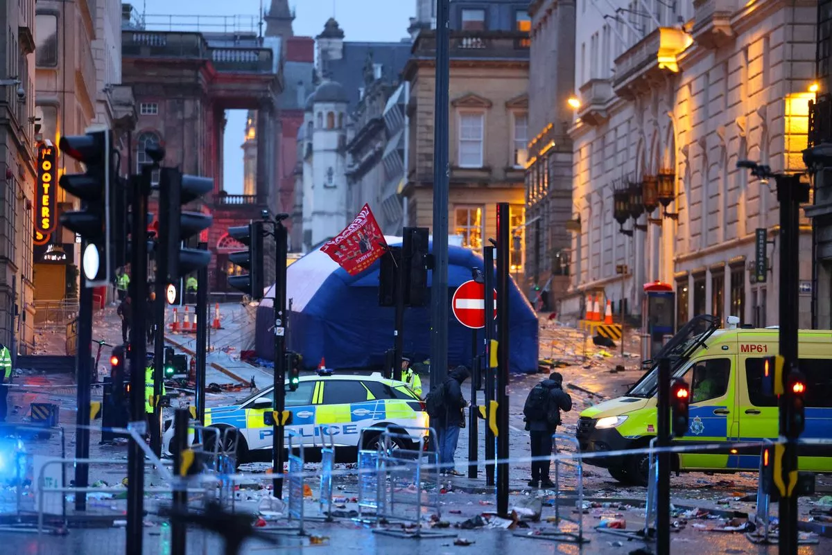 The emergency scene on Water Street, Liverpool after Paul Doyle drove his car into the Liverpool parade crowds back in May
