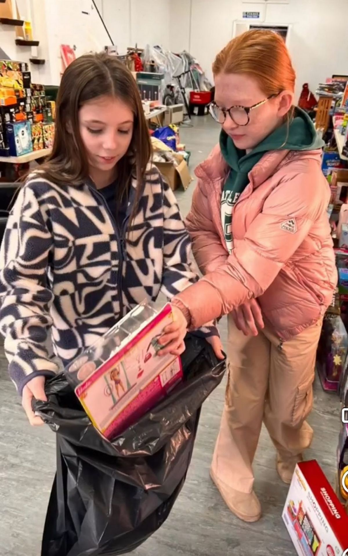 11-year-old pals Alyssa Mawdsley and Sienna Johanson raised cash and bought gifts to donate to the Kirkby Toy Appeal 