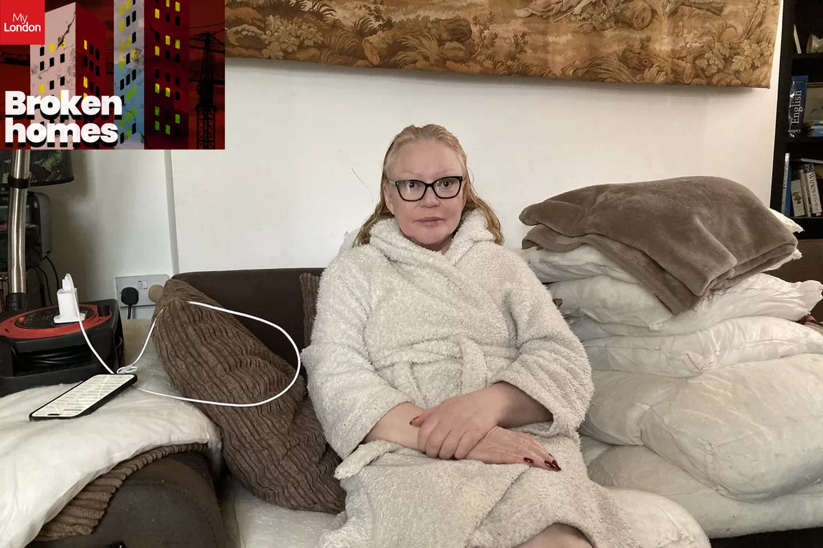A woman sitting on a sofa in a dressing gown