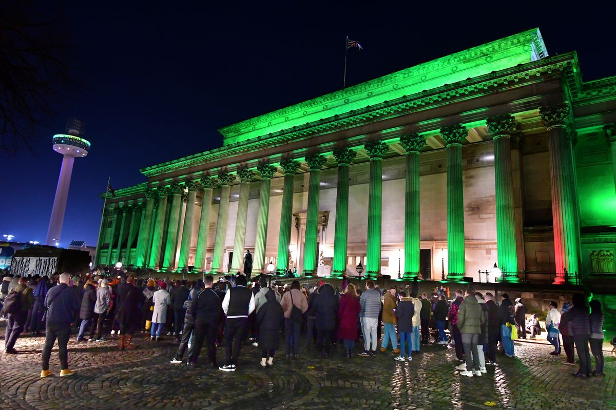 St George's Hall is illuminated green, at the Vigil for The Vivienne