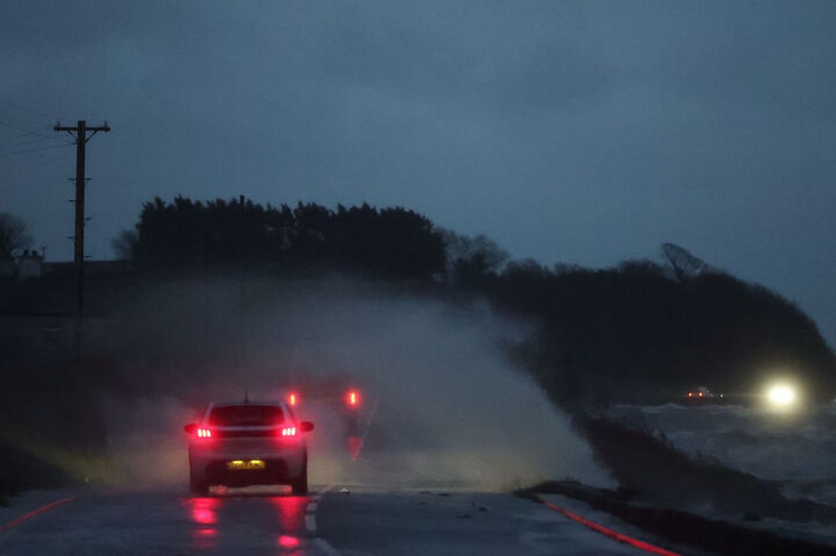 Water splashes up across the road in Portaferry, Co Down