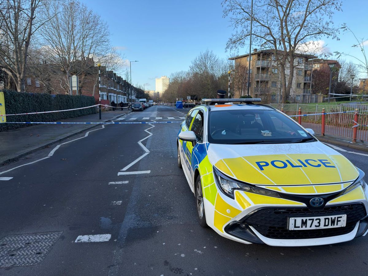 Police are at the scene after a man was shot dead in Stonebridge