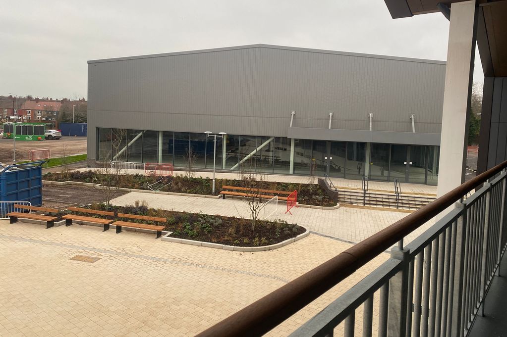 The large grey building on the Grayson Place development will play home to the indoor padel tennis courts