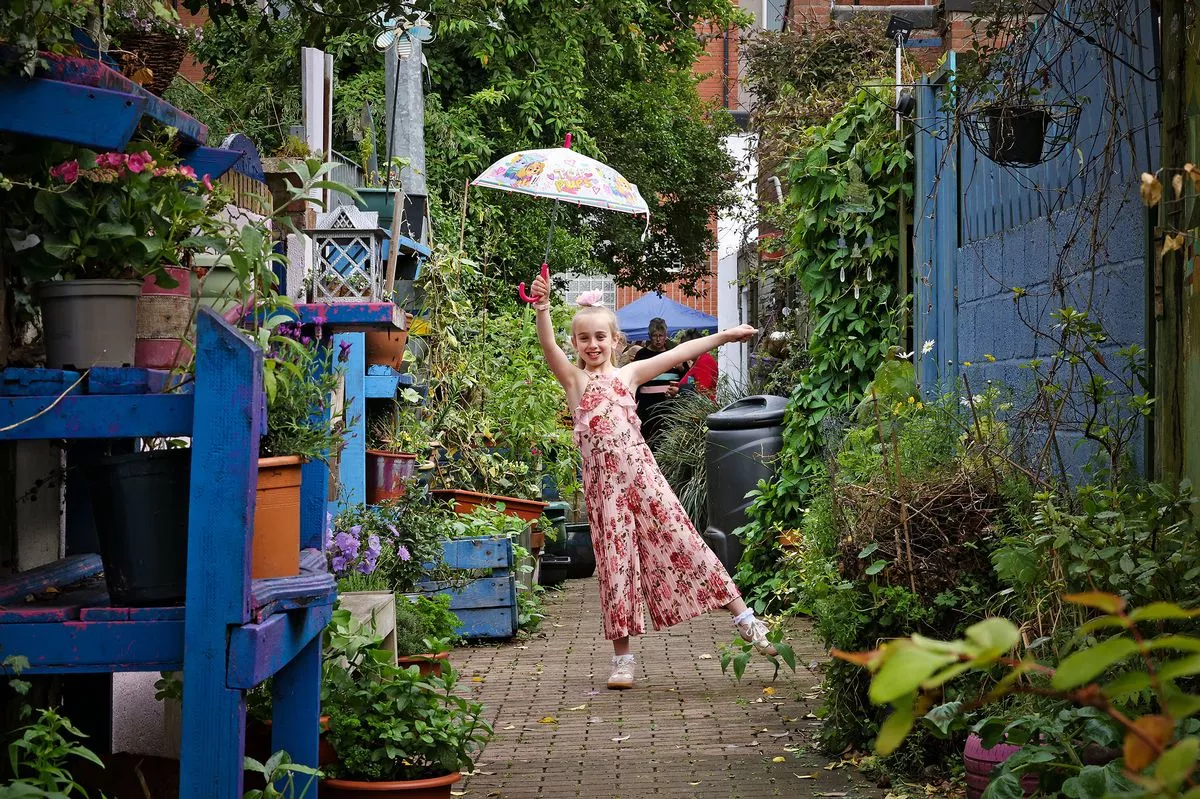 Maya enjoying the 10th Anniversary Celebration of Wildflower Alley.