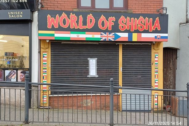 World of Shisha, Drake Street, Rochdale with closure notice on
