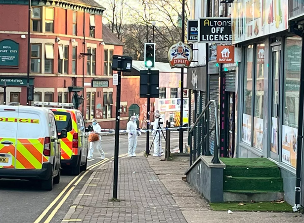 Forensic officers at the scene in Sheffield. 