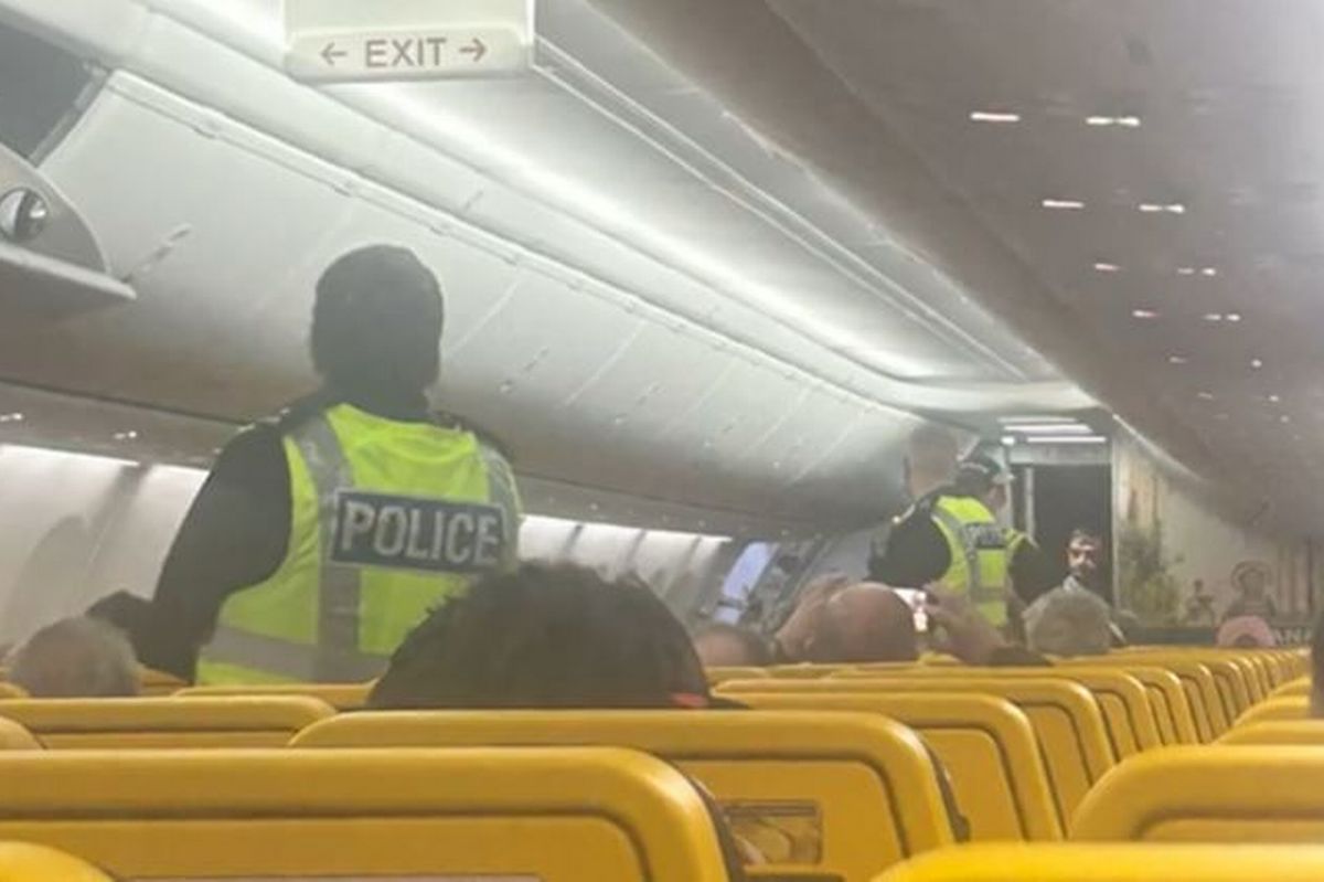 Officers boarded the plane after it landed at Edinburgh Airport.