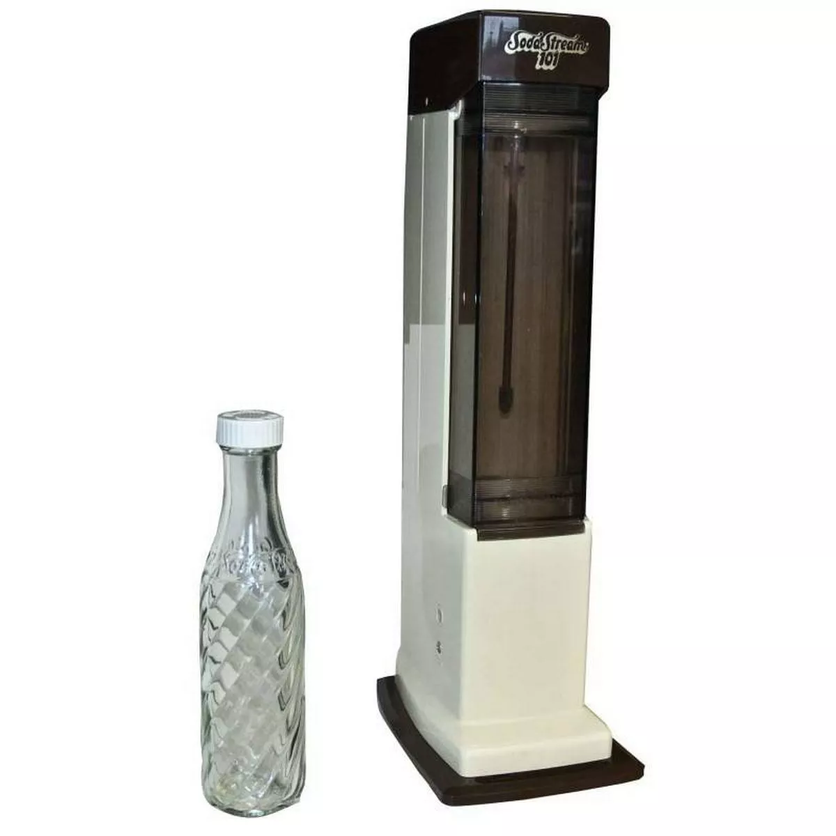 An image depicts a modern bottle-filling apparatus positioned next to a glass bottle with a cap. The apparatus features a sleek design with a brown and white color scheme, suggesting functionality and efficiency in its operation. The glass bottle appears to be a standard size commonly used for various beverages.