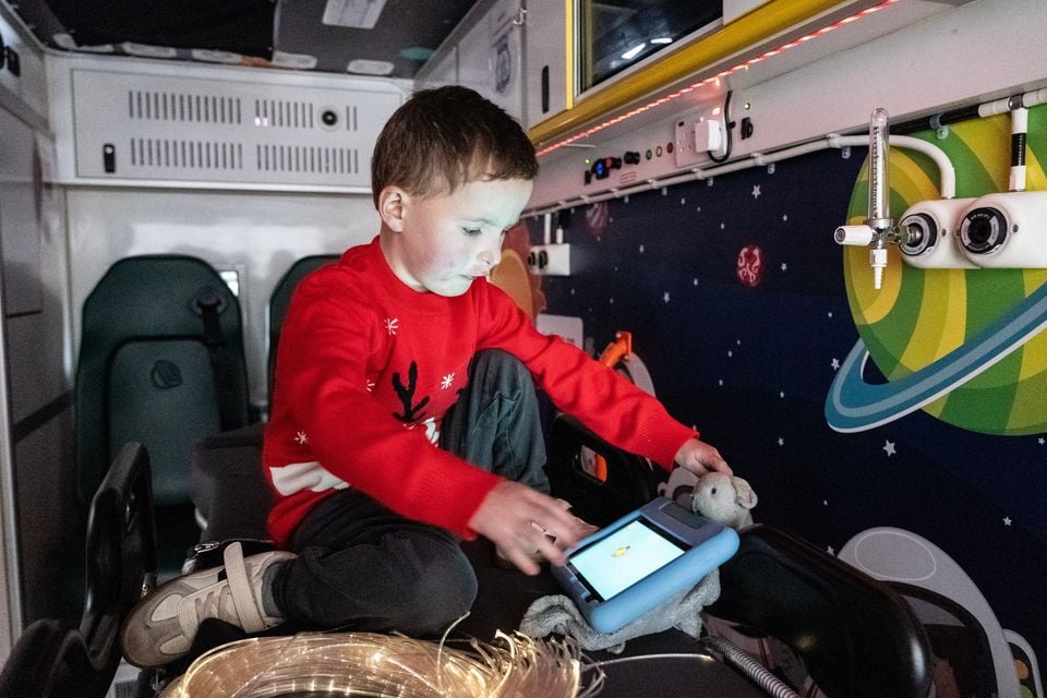 Reuben Kirkpatrick (5) in the ambulance (Luke Jervis/Belfast Telegraph)