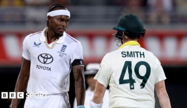 England fast bowler Jofra Archer (left) stares down Australia batter Steve Smith (right)