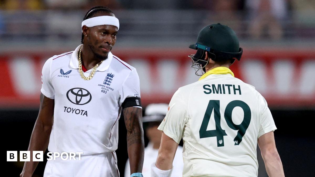 England fast bowler Jofra Archer (left) stares down Australia batter Steve Smith (right)