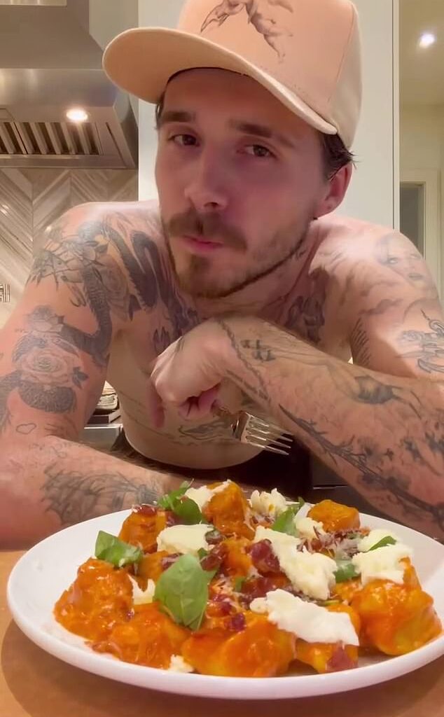 Brooklyn Beckham gave his followers a glimpse of his shirtless physique as he showed off his latest cooking creation on Monday