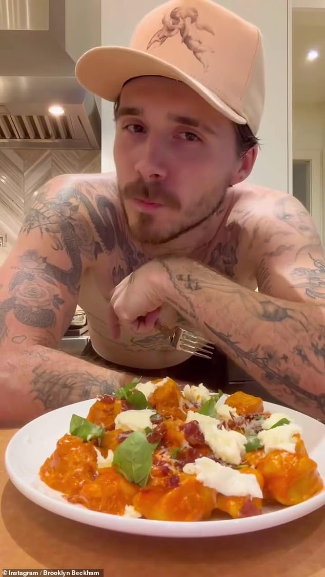 Brooklyn Beckham gave his followers a glimpse of his shirtless physique as he showed off his latest cooking creation on Monday