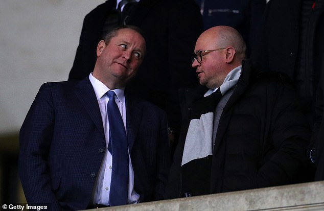Former Newcastle owner Mike Ashley (left), pictured back in 2020 alongside then managing director of the Magpies Lee Charnley, is in the running to own Sheffield Wednesday
