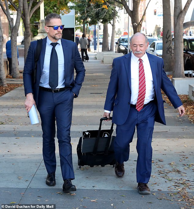 Gruffudd was seen walking out of court Friday after his attorney, Joseph Langlois, successfully persuaded the judge, alongside Evans’ lawyer, to grant the embattled exes another 'mandatory settlement conference', now scheduled for January 6