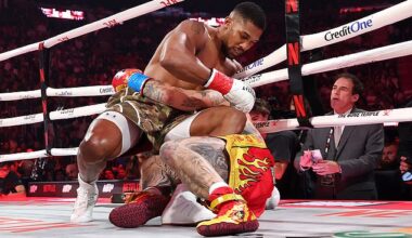 Anthony Joshua ends up on the canvas with Jake Paul - but went on to win the fight
