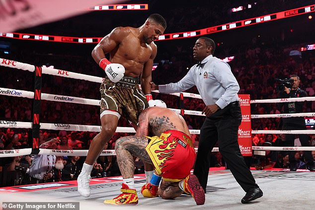 Throughout the bout, Paul dived around the ring and at times even grabbed Joshua's legs