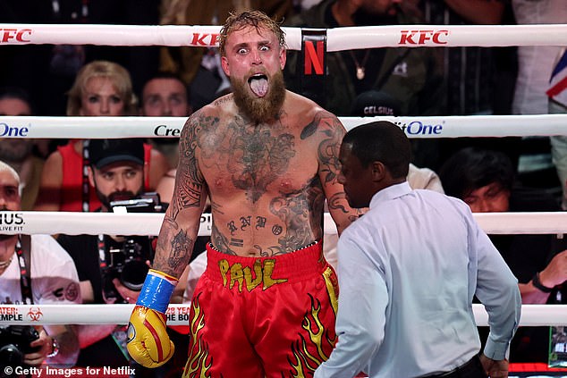 Despite finishing the fight bloodied and bruised, Paul still found time to stick his tongue out