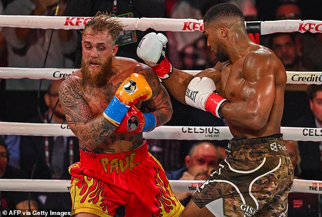 After Logan taunted Joshua, the Englishman delivered a sixth-round knockout blow