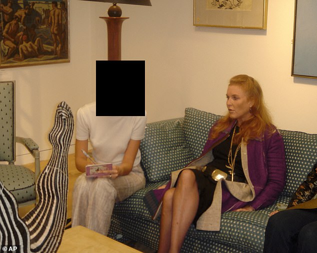 Sarah Ferguson sits on a sofa in an undated photograph releeased by the US Department of Justice