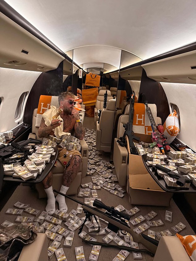Jake Paul looked in the mood to celebrate his bumper payout as he returned home from Miami