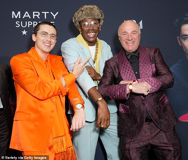 'I first got the script about a year ago,' confessed Daily Mail columnist Kevin O'Leary, 'then I forgot about it' (Pictured: O'Leary with Tyler, The Creator (center) and Timothee Chalamet at Marty Supreme premiere in New York City on December 16)