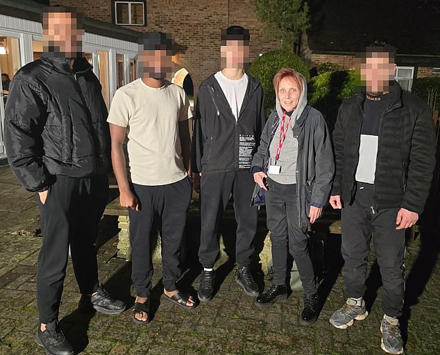 The Brasserie restaurant at the Copthorne Hotel was once a much-loved family venue. Yet today, it is no longer open to the public after the hotel, just three miles from Gatwick in West Sussex, became migrant accommodation in 2021. Pictured: Sue Reid with a group of migrants living in the hotel, who invited her to tour it