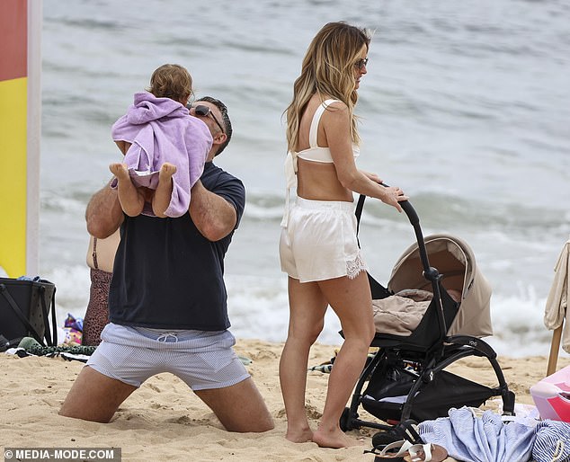 The British WAG proudly showcased her incredible post-baby body just months after giving birth, wearing a white sports-bra style top paired with matching shorts that highlighted her toned figure