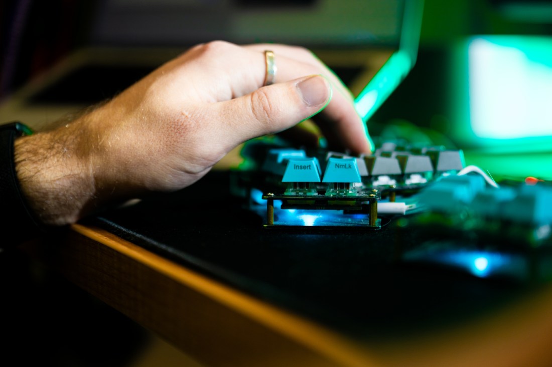 Levi Kaplan's hands typing on a keyboard. 