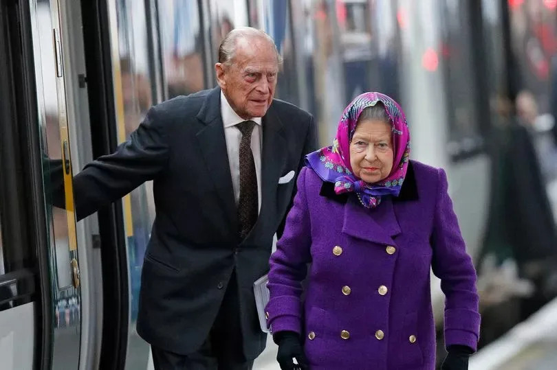 Queen Elizabeth II and Prince Philip, Duke of Edinburgh arrive at King's Lynn station, after taking the train from London King's Cross, to begin their Christmas break at Sandringham House on December 21, 2017 in King's Lynn, England.