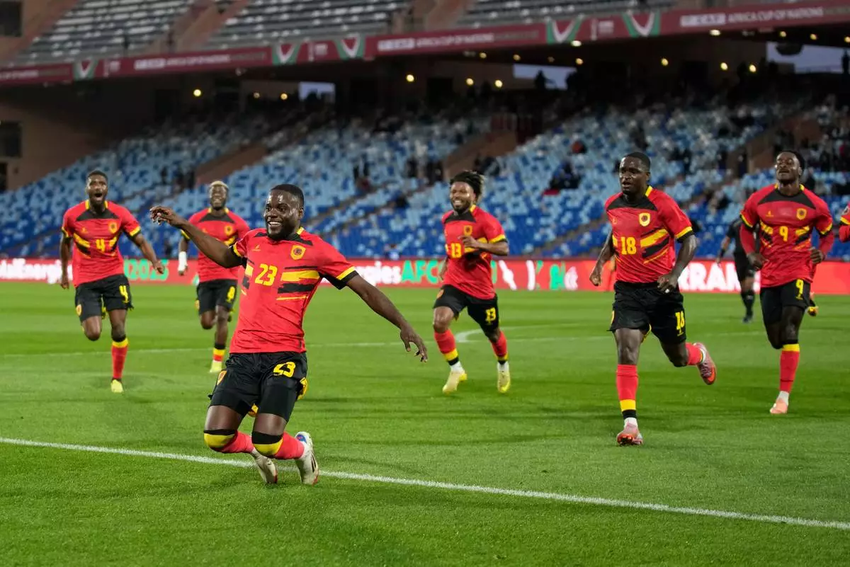 Angola's Show Cafumana celebrates after scoring a goal during the Africa Cup of Nations group B soccer match between Angola and South Africa in Marrakech, Morocco, Monday, Dec. 22, 2025. (AP Photo/Themba Hadebe)